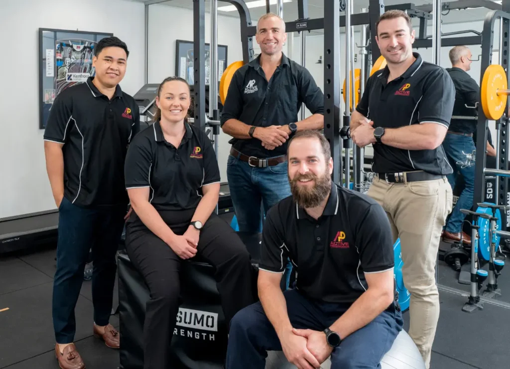 Team of Cairns physiotherapists in their clinic gym